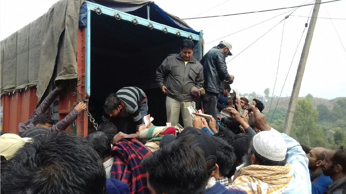 farmars covers trusk for wheat seedsin rajouri