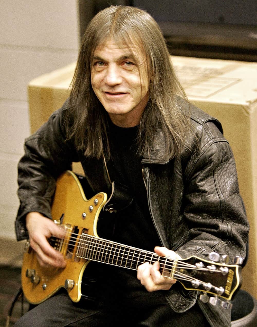 AC/DC co founde and guitarist malcolm young passes away at 64
