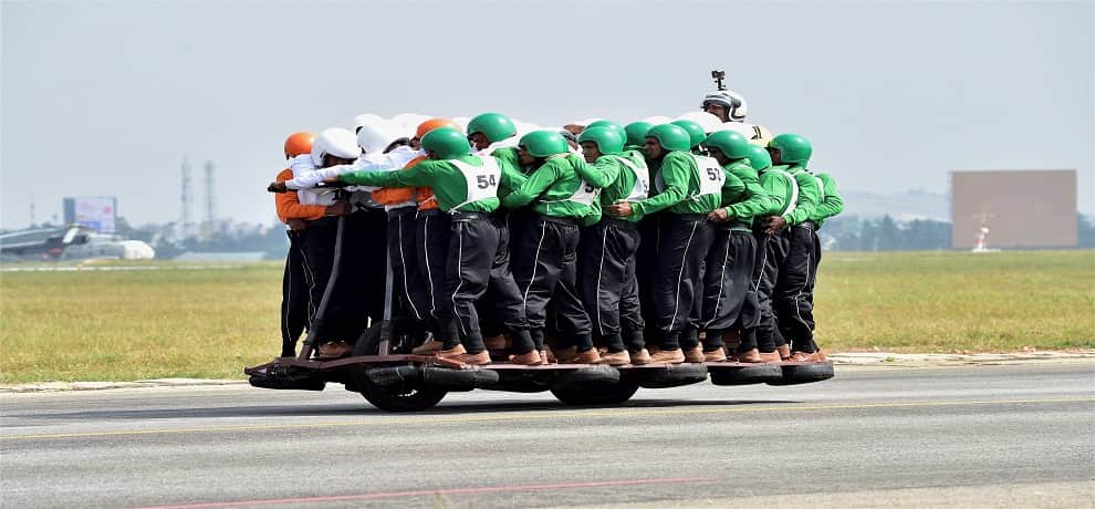 Army Service Corps attempts a record for the most men on a single moving motor cycle