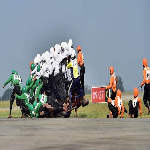 Army Service Corps attempts a record for the most men on a single moving motor cycle