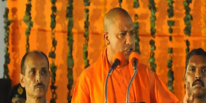 up police wear off muslim woman burqa in yogi rally at ballia
