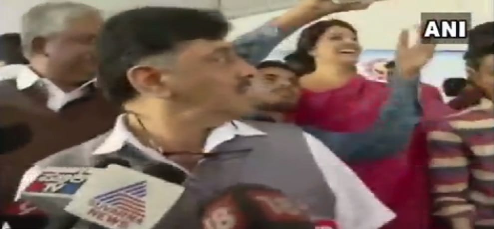 Karnataka minister Shivkumar hits a man while taking a selfie