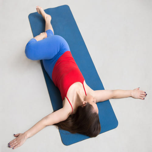 if you want to get rid of stomach related diseases include supta matsyendrasana in your routine