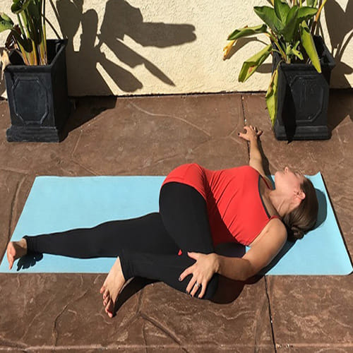 if you want to get rid of stomach related diseases include supta matsyendrasana in your routine