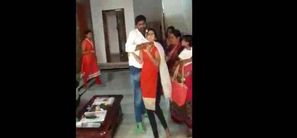 TRS leader Srinivas beats first wife in public