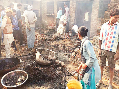 Burnt fire, luggage and buckets in the marriage house