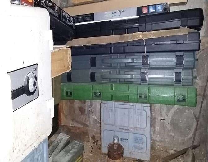 A man found Guns And Money in Secret Safe at his new house