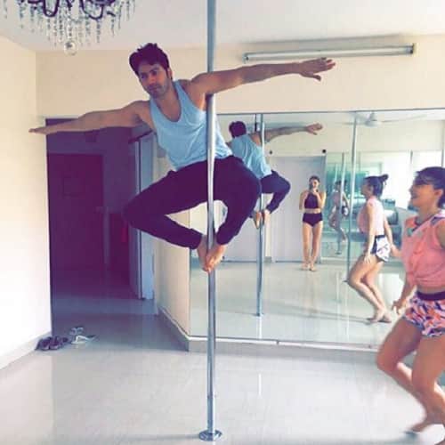 Bollywood actor Varun Dhawan trying to copy Jacqueline Fernandez Yogini pose 