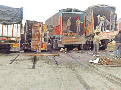 The trucks on the National Highway are