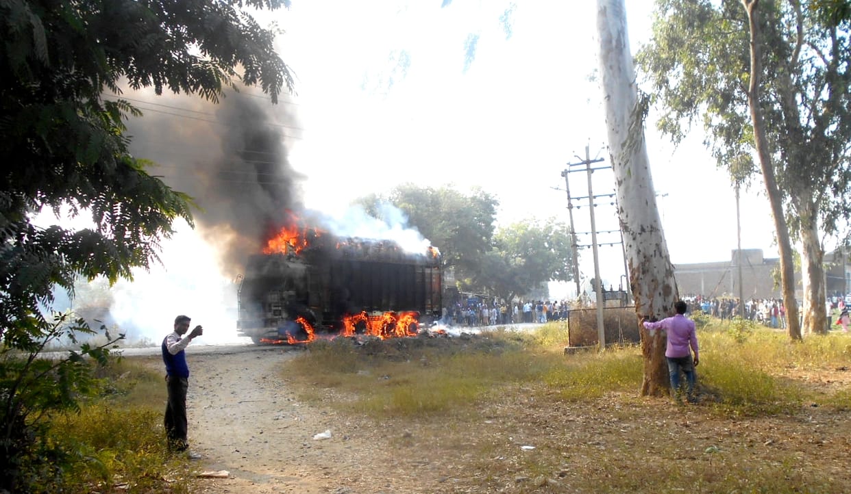truck caught fire at bhadohi after touch with wire