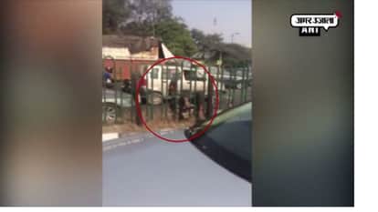 MAN HANGS ON DIVIDER AFTER MEETING WITH ACCIDENT NEAR KALKAJI METRO STATION DELHI