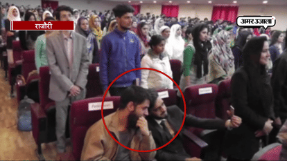 STUDENT SEEN CLICKING SELFIE DURING NATIONAL ANTHEM 