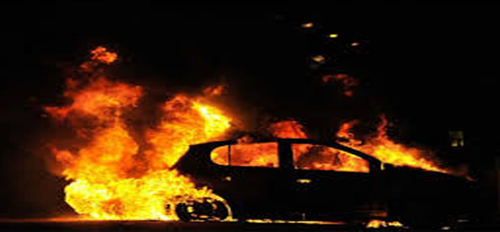 fast moving car made fireball on the highway in the dark night