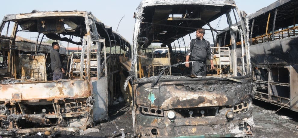 six buses in parking area burnt in timarpur
