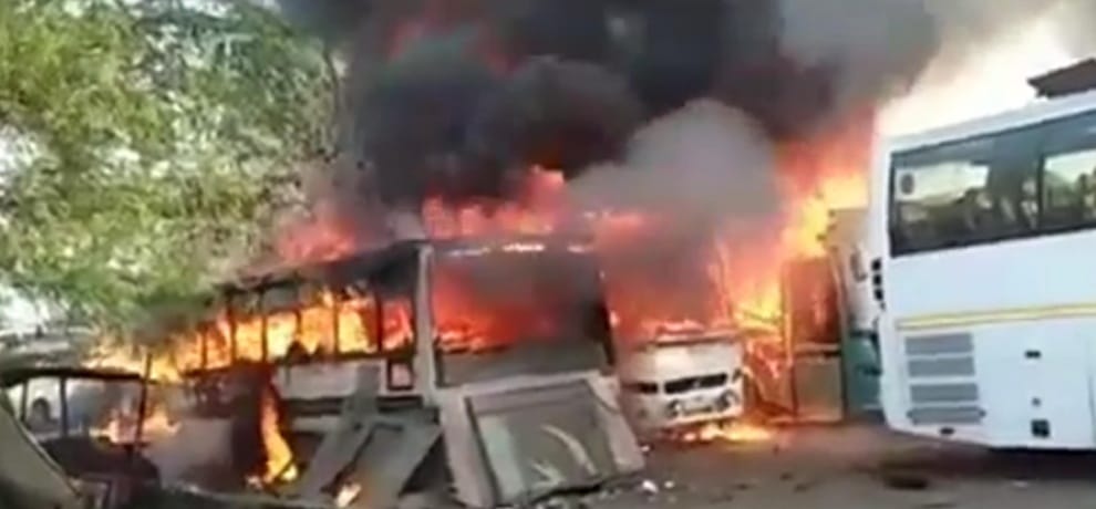six buses in parking area burnt in timarpur