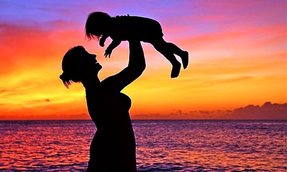in front of Mother love everything seems very small
