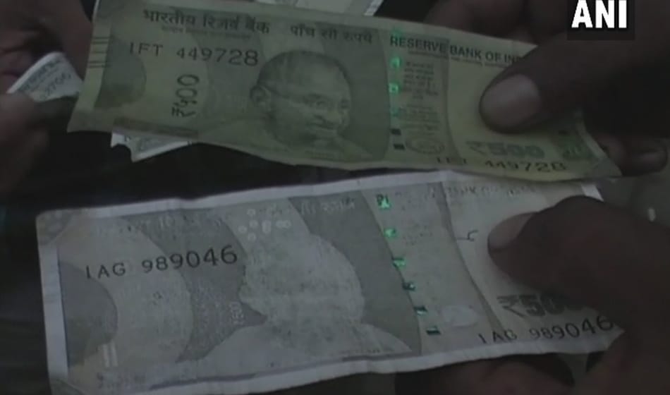 rbi rules to exchange damaged indian currency