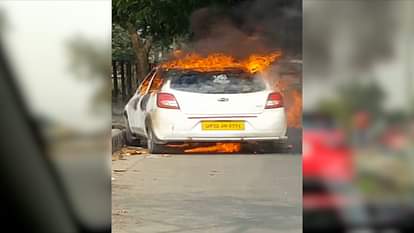  fire in the car on road in lucknow.