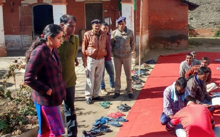 Prisoner taking training in sewing-weaving