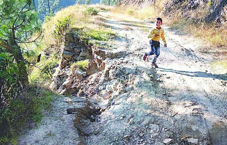 Road is cut off, but life threatens to travel