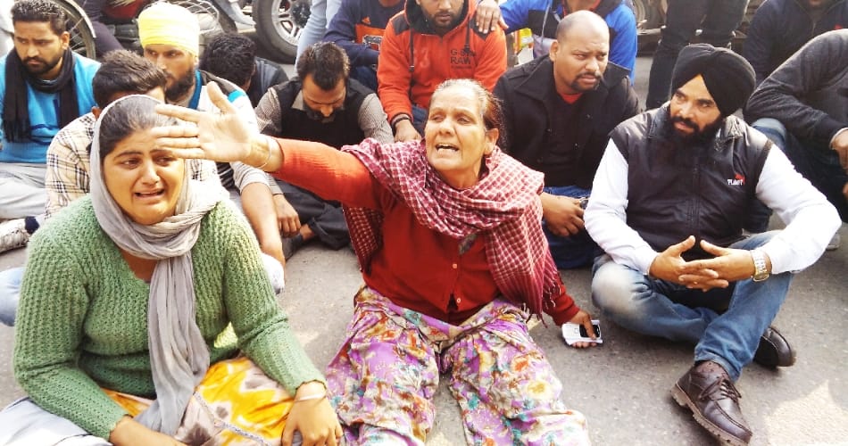 Mothers and sisters sit on Strike for the arrest of Murderer