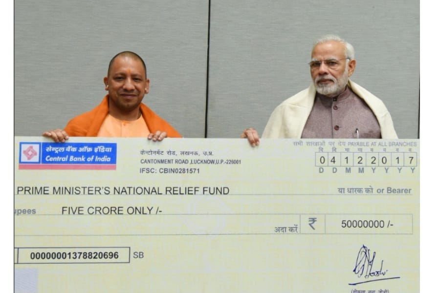yogi adityanath gives five crore rupees in prime minister relief fund.
