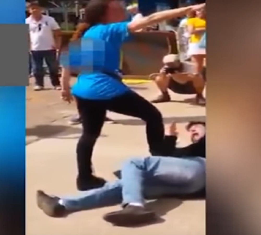 After teasing incident Woman rubs breasts on mans face in street