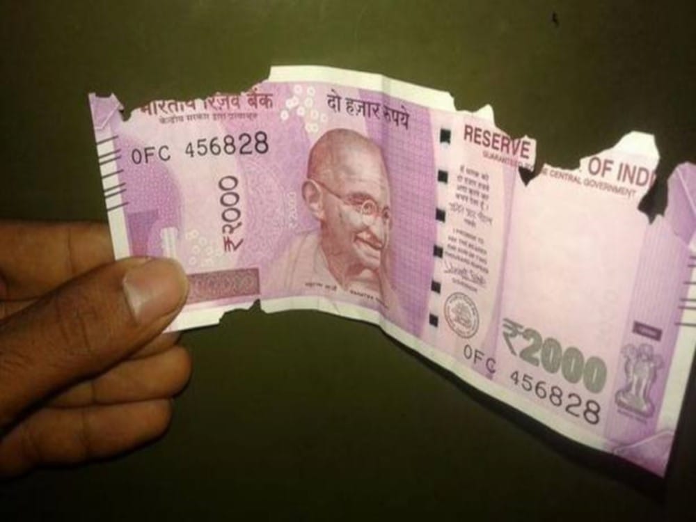 rbi rules to exchange damaged indian currency