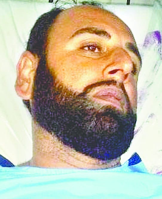 property dealer shot when he was opening the door 