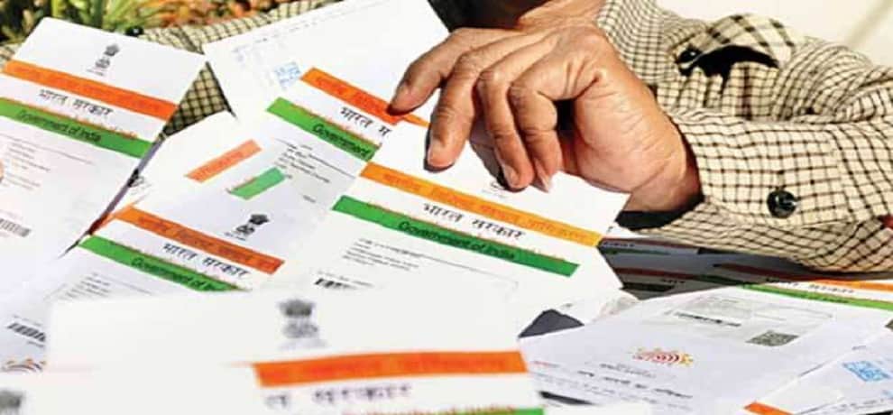 for aadhaar 70 year old father Loaded his disabled son on back in tilwada