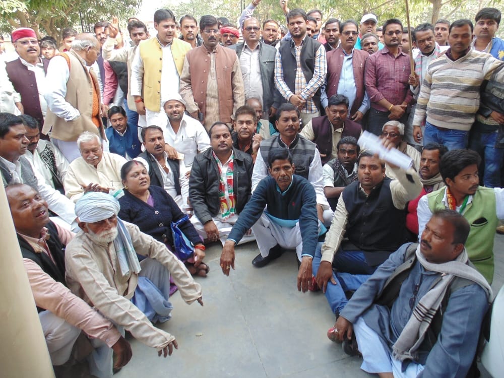  In front of DM's office in front of power tariff hike