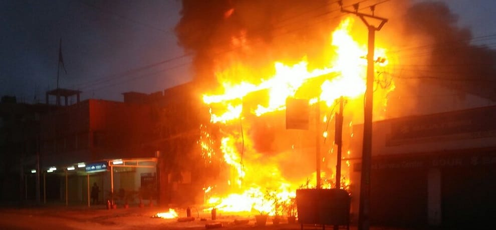 three shope gutted in fire