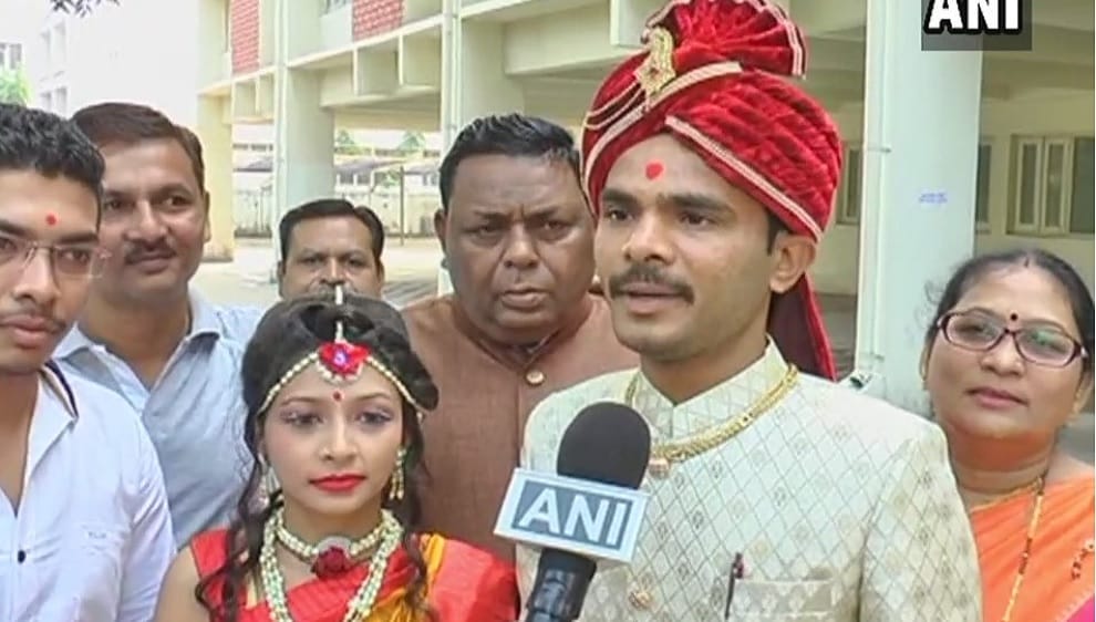 gujarat election 2017 first phase election wedding couple cast votes