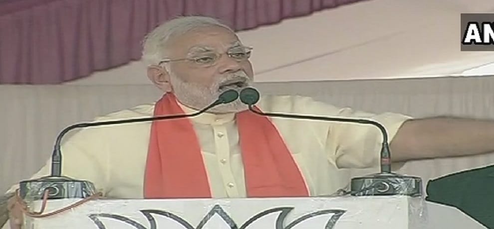 PM Modi said,  Development is one side, Congress racism is other side