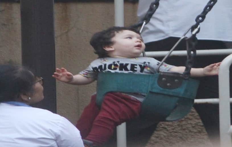 see in pictures taimur ali khan day out and swinging in park