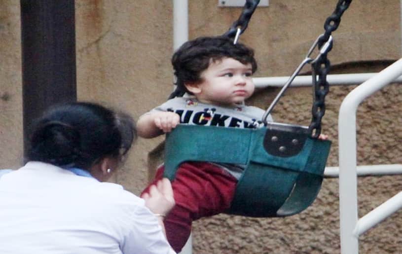 see in pictures taimur ali khan day out and swinging in park