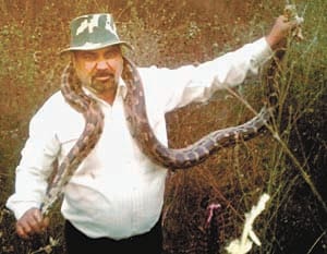 Seven seven feet of Python then removed in Shyama Prasad