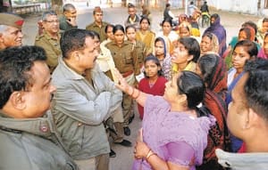 womens clash with inspector