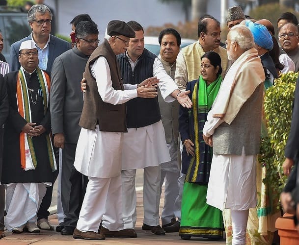 After Gujarat elections campaigning ended PM Modi and Manmohan Singh shaking hands
