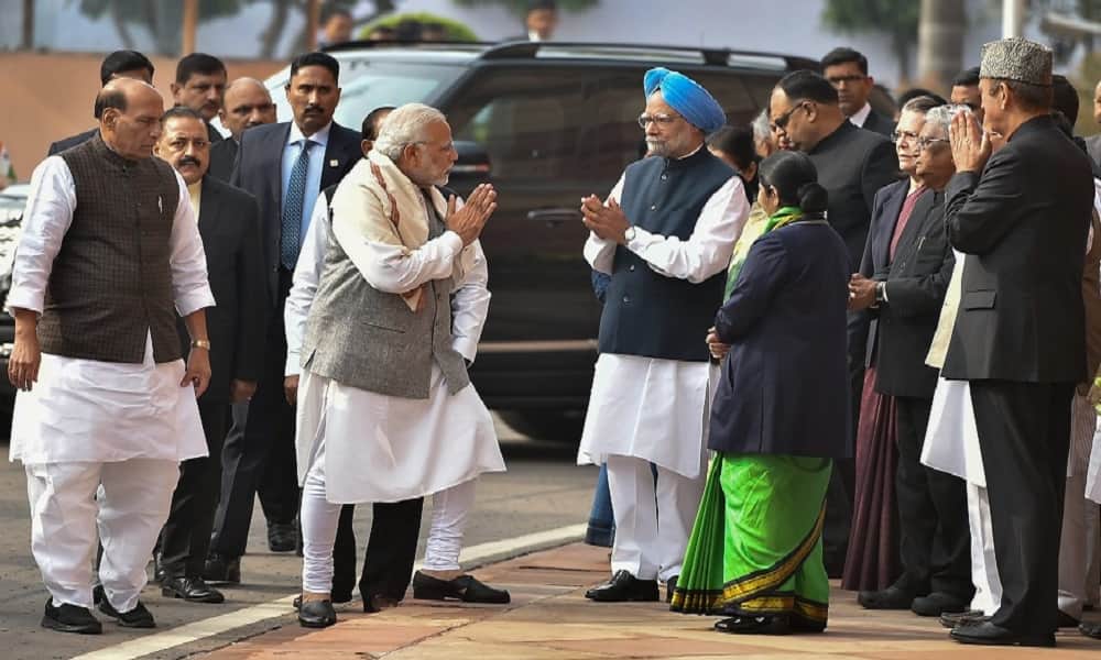 After Gujarat elections campaigning ended PM Modi and Manmohan Singh shaking hands