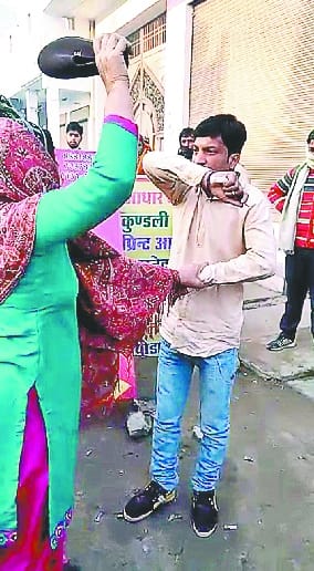 Wife beaten professor