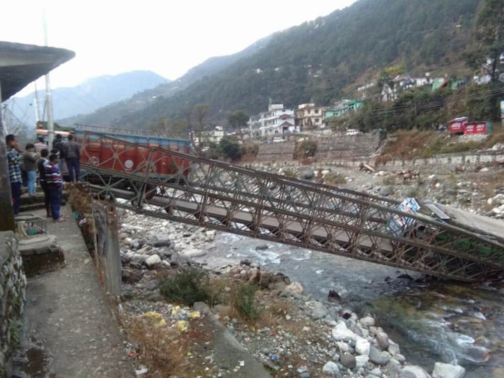 horrible photos of uttarkashi valley bridge broken on Gangotri highway