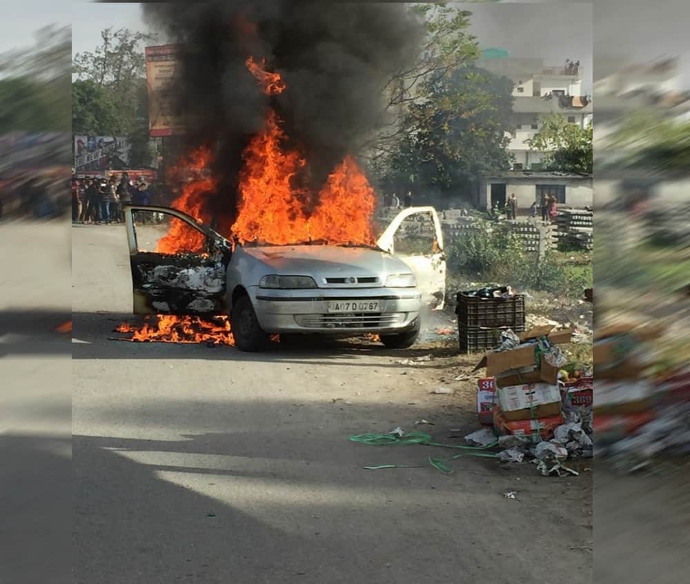 car caught fire during going to attend marriage in dehradun