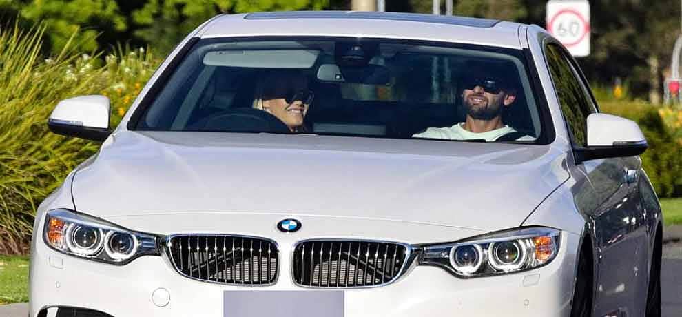 Australian cricketer Nathan Lyon passionately kisses glamorous blonde