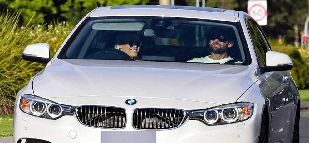 Australian cricketer Nathan Lyon passionately kisses glamorous blonde