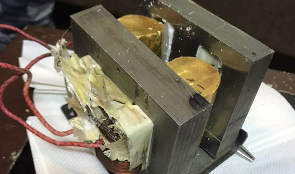 gold cylindrical Microwave oven seized at igi airport with market value of Rs 56,69,400