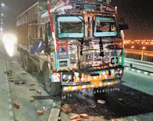 Two brothers aboard a tractor trolley collide with truck collision