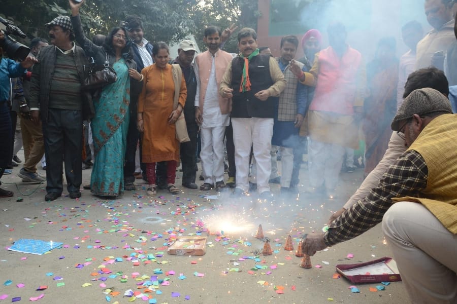BJP activists celebrate victory of Gujarat and himachal pradesh in Lucknow.