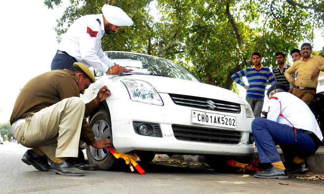 parents must aware about childrens, car toe by chandigarh traffic police
