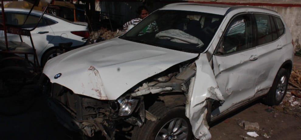 businessman was drunk and driving bmw and hit the divider, injured
